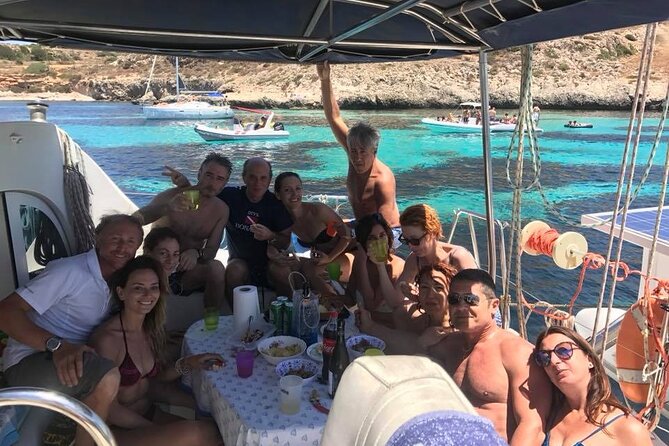 1-Catamaran tour to the Maddalena Archipelago from Cannigione - Razzoli and Santa Maria add cliffs, a lighthouse, and history
