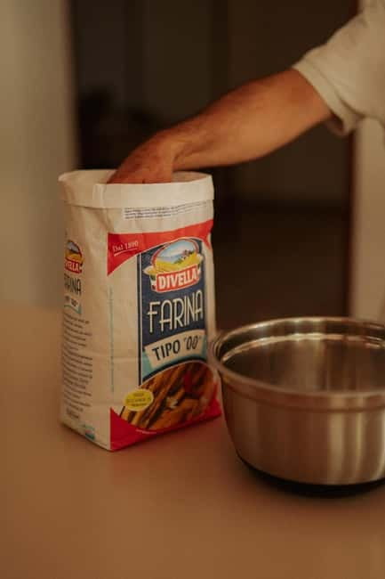 Amalfi: Cooking Class with Pasta, Mozzarella, and Tiramisù - Rolling pasta for the main course