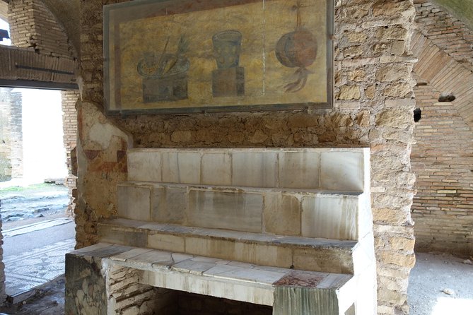 Ancient Ostia Antica Semi-Private Day Trip from Rome by Train with Guide - What the $59.26 price really covers