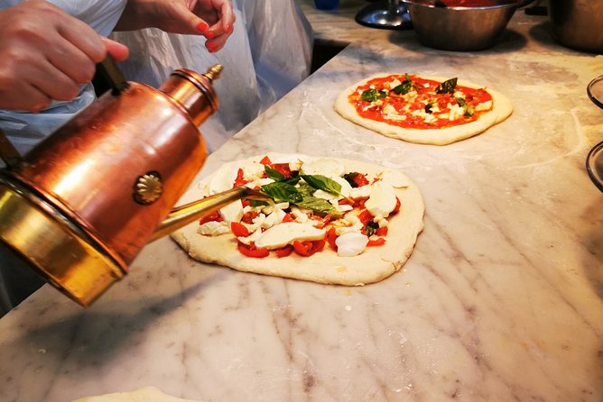 Authentic Pizza Making Class in Naples with Appetizers and Drink - The instructors shape the experience