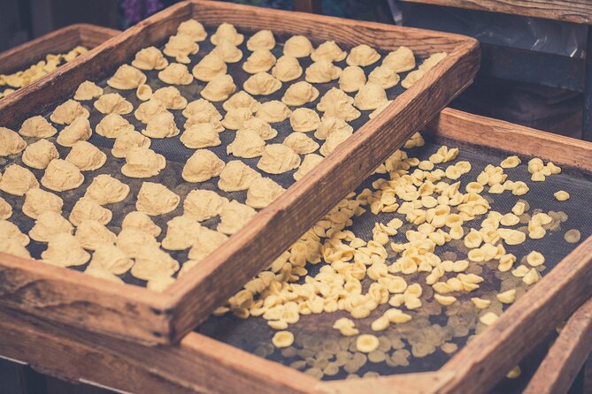 Bari Walking Tour with Pasta Experience - Piazza Ferrarese and a trace of the Roman road
