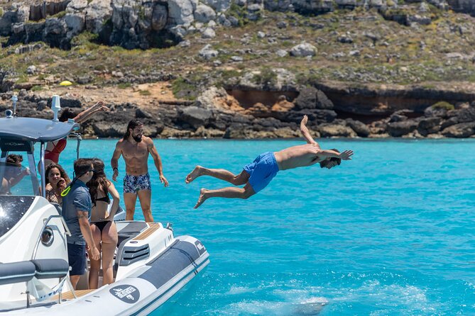 Boat Tour Egadi Day discover Favignana and Levanzo from Trapani - Cala Rossa brings the most famous scenery