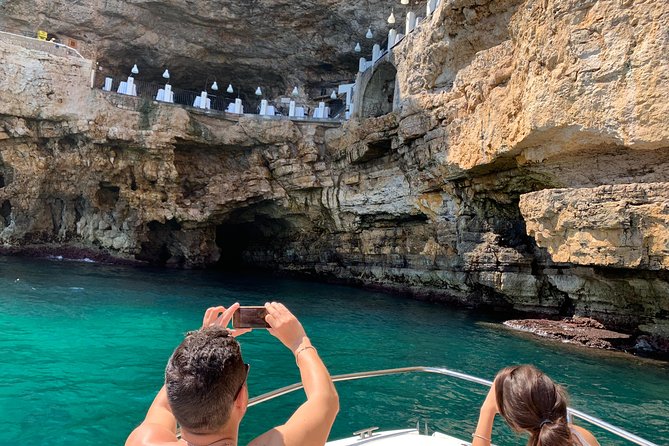 Boat tour of the Polignano a Mare caves with aperitif - Why the coast is best seen from a boat