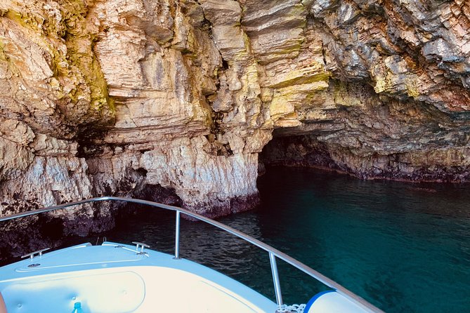 Boat tour of the Polignano a Mare caves with aperitif - Grotta Azzurra and the changing blue light