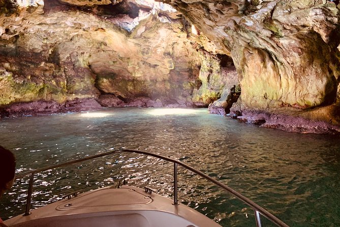 Boat tour of the Polignano a Mare caves with aperitif - Grotta Palazzese and the famous restaurant
