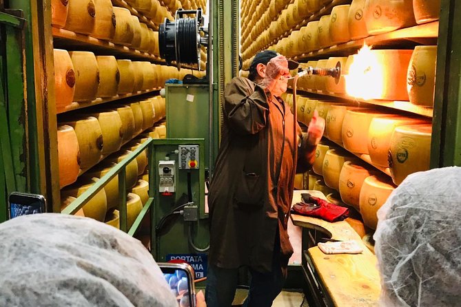 Bologna Food Experience: Factory tours & Family-Style Lunch - Prosciutto and the care behind two ingredients