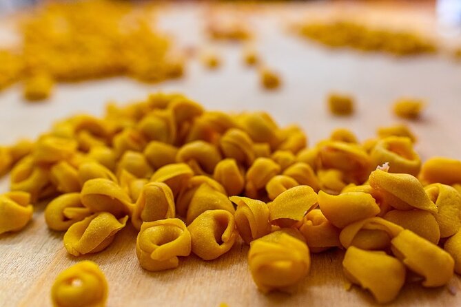 Bologna Food & Market Tour with 6 Tastings, Pasta, Wines & More - Parmigiano and balsamic, the useful tastings
