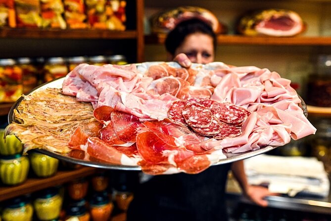 Bologna Food & Market Tour with 6 Tastings, Pasta, Wines & More - Walking through the Quadrilatero