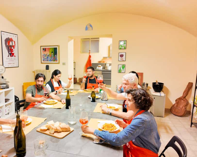 Bologna: Pasta Tagliatelle Ragu Cooking Class with Spritz - Eating tagliatelle with house ragù