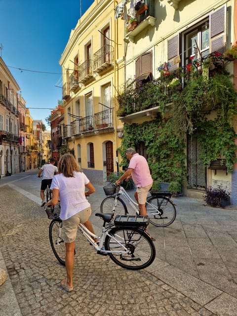 Cagliari: 2-Hour Guided E-Bike Tour with Coffee - Villanova and its flower-filled streets
