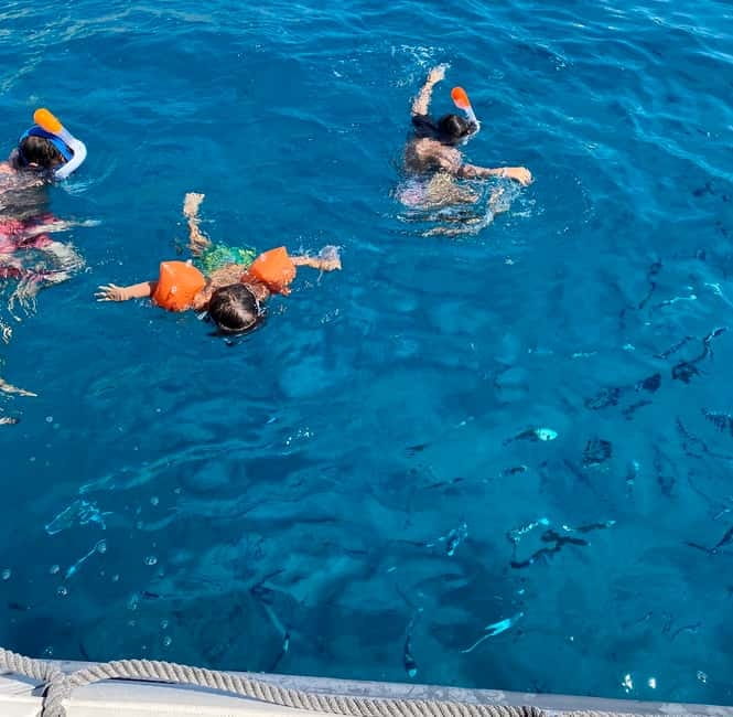 Cagliari: Boat Tour with Snorkeling, GoPro & Sardinian Beer - What the guides add to the experience