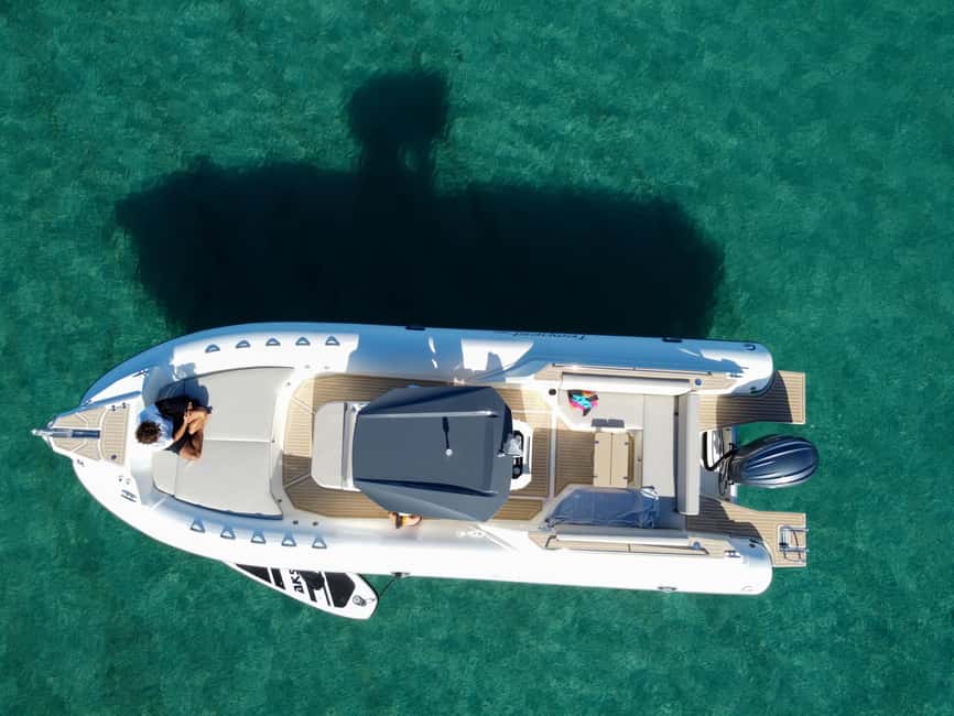 Cagliari: Coastline Cruise with Drinks and Snorkeling - Poetto: a change from rocky coves to open beach