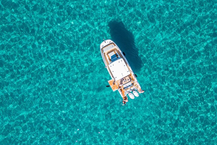 Cagliari: Luxury Motorboat Tour with 3 Swim Stops & Wine - Cala Fighera and the longer second stop