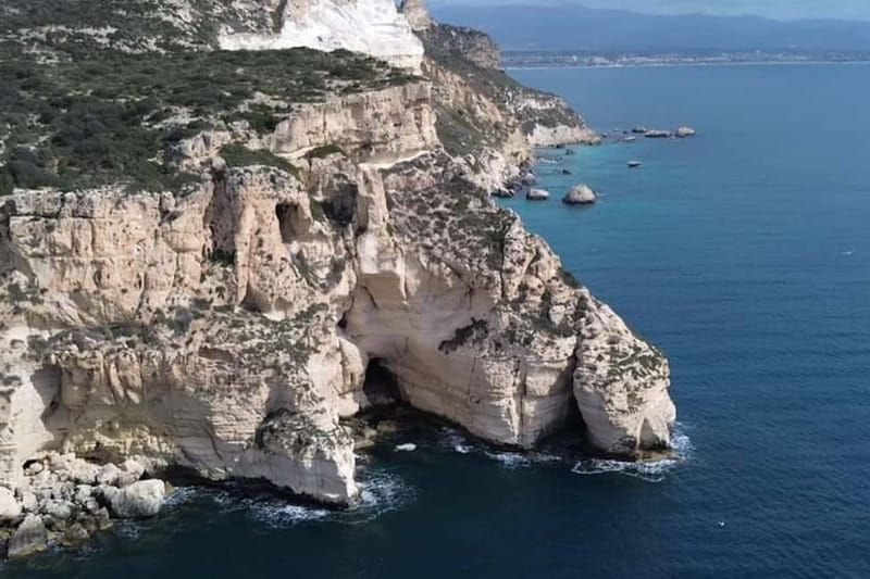 Cagliari: Sailing Tour with 4 Stops, Snorkeling and Prosecco - Sella del Diavolo, the tour’s main scene