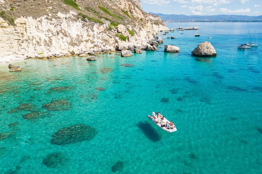 Cagliari: Zodiac Boat Tour, 3-4 SwimStops, Wine & Snorkeling - The final cove near Sella del Diavolo