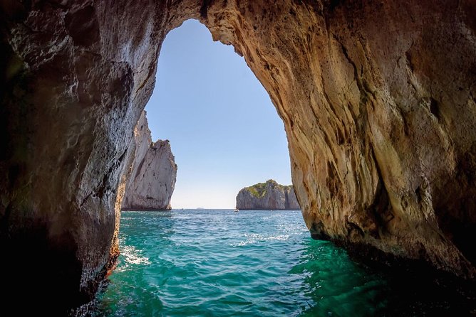 Capri Boat Tour from Sorrento: Swim, Grottos & Light Lunch - Faraglioni, Villa Malaparte, and Punta Carena