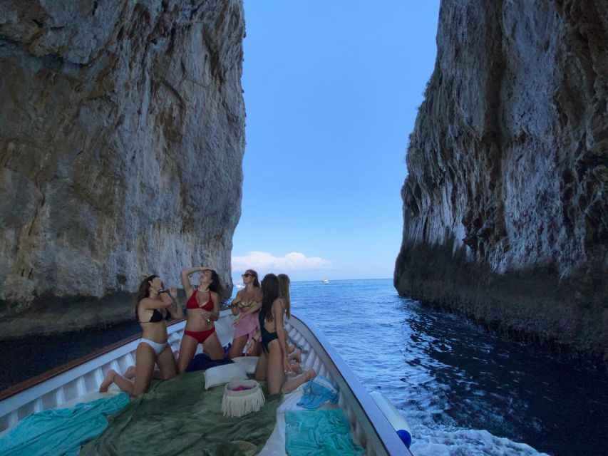Capri: Island and Grottos Boat Cruise with Snacks and Drinks - Why seeing Capri from a small boat makes sense