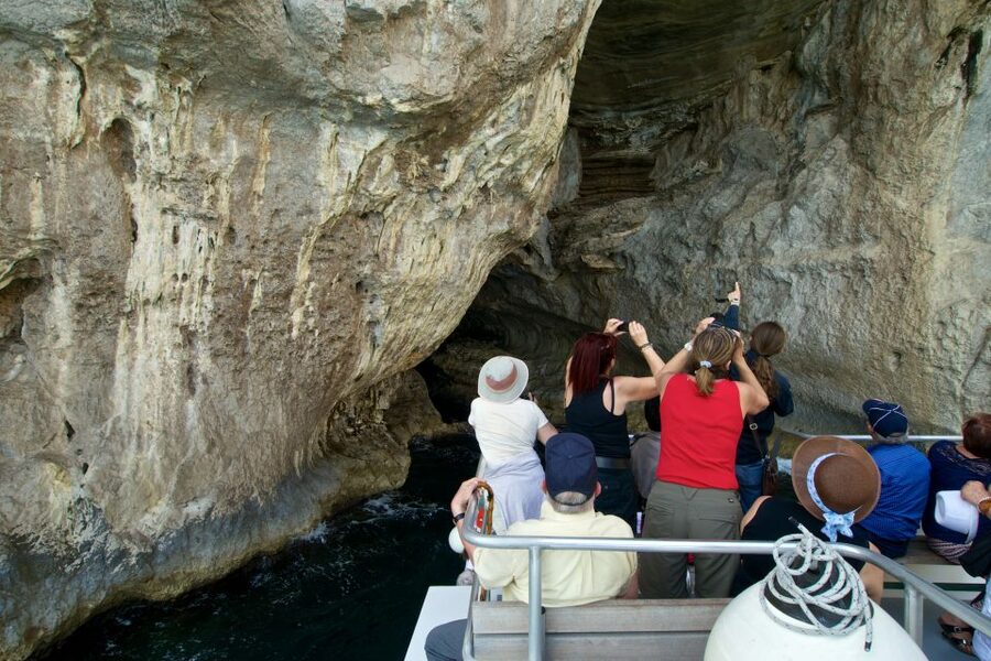 Capri: Island Sightseeing Tour with Blue Grotto Stop - Faraglioni, Natural Arch, and the island’s famous cliffs