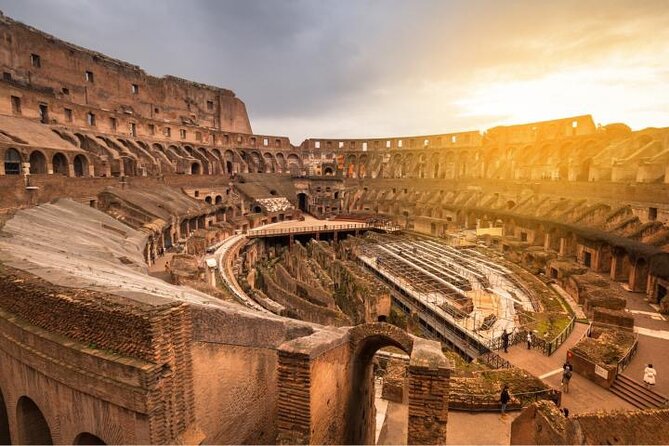 Colosseum Arena Floor, Roman Forum & Palatine Hill Tour - Entering the Colosseum through the gladiators’ gate
