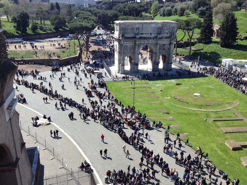 Colosseum, Forum & Palatine Hill Guided Walking tour - Entering the Colosseum and picturing the arena