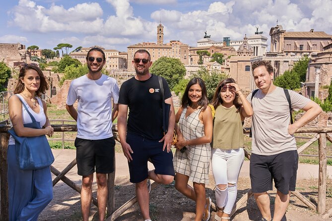 Colosseum, Palatine Hill and Roman Forum Guided Tour - Walking Through the Roman Forum