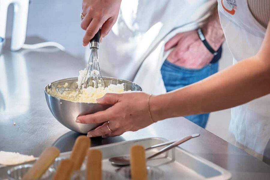 Florence: Handmade Pasta & Dessert Class with Unlimited Wine - Sitting down to eat what you made