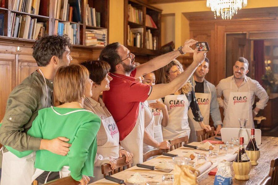 Florence: Pizza and Gelato Experience with Unlimited Wine - Cooking your pizza in a real pizza oven