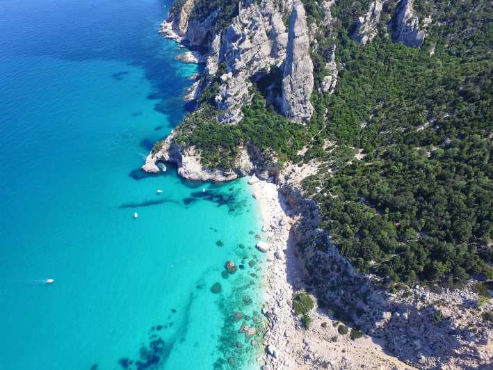 From Arbatax: Full-Day Guided Boat Tour of the Baunei Coast - Leaving Arbatax on the Falco della Regina