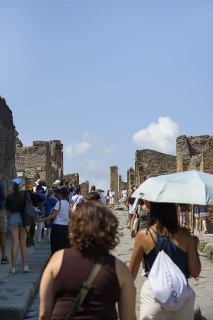 From Naples: Pompeii and Vesuvius Guided Day Trip with Lunch - Walking toward the crater of Mount Vesuvius