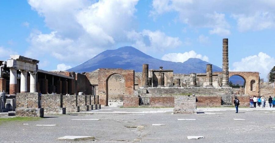 From Sorrento: Day Tour to Pompeii Ruins and Mount Vesuvius - Walking through Pompeii with a local guide