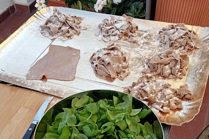 Homemade Pasta and Pesto Class with a Local Chef in Genoa - Making pesto in Genoa, the city that claims it
