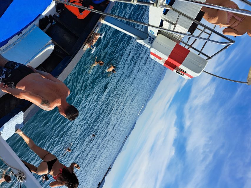 Ischia: Island Boat Tour with Neapolitan Lunch & Snorkeling - Final swims at Spiaggia degli Inglesi and Varulo