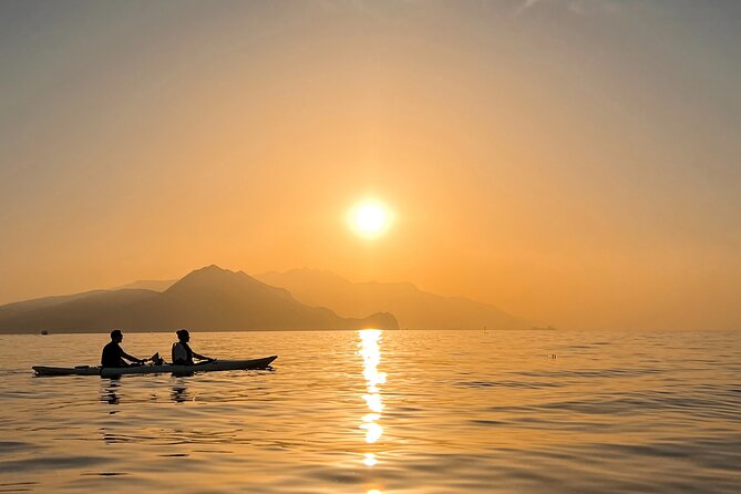Kayak tour in Capri between caves and beaches. Photos included. - Paddling into Grotta dell’Acqua