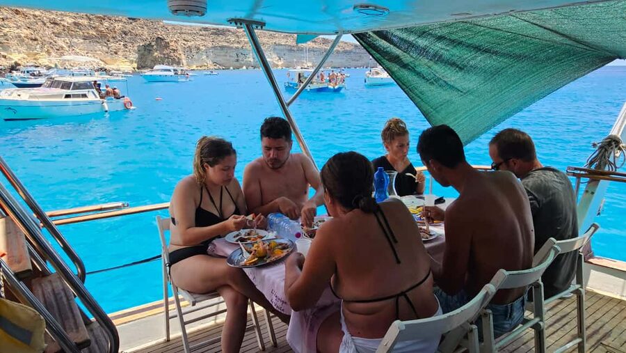 Lampedusa: Yacht excursion, swimming stops and typical lunch - Cala Pulcino and the changing route