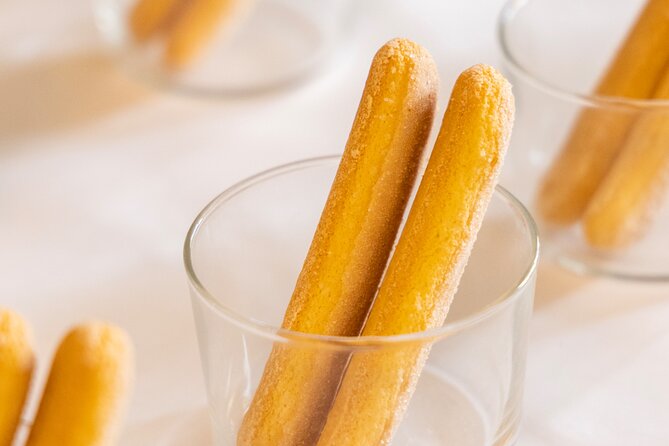 Learn to Make Pasta & Tiramisu with Wine and Limoncello Included - Sitting down to eat what you made
