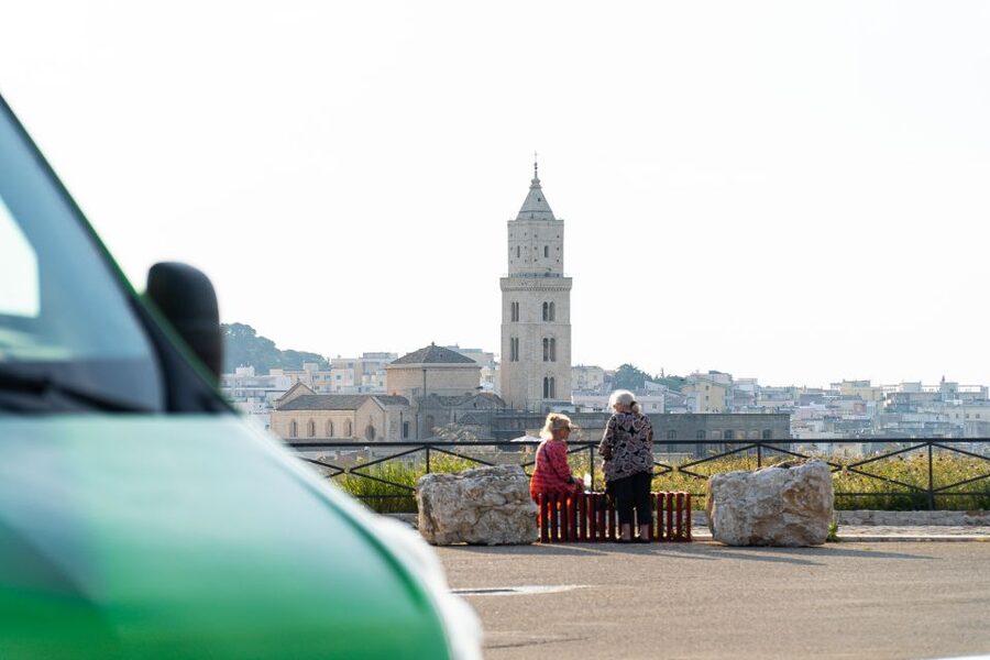 Matera: Open Top Bus Tour with Entrance to Casa Grotta - Piazza Vittorio Veneto shows modern Matera beside the Sassi