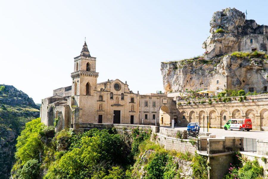 Matera: Open Top Bus Tour with Entrance to Casa Grotta - Via Madonna delle Virtù and Porta Pistola reach the Gravina edge