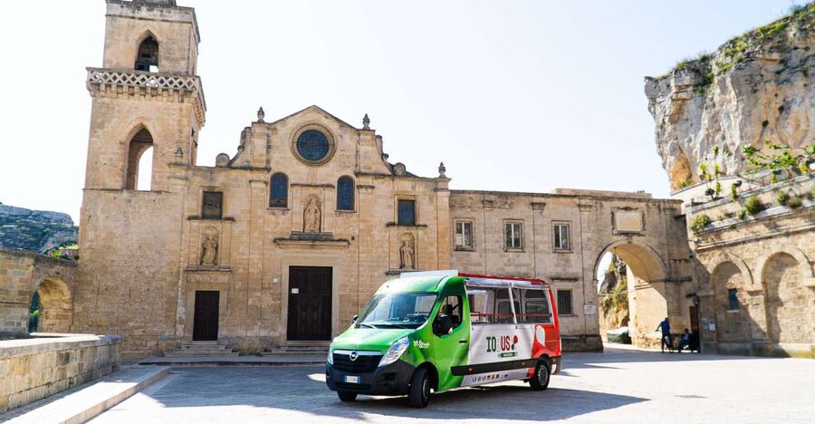 Matera: Open Top Bus Tour with Entrance to Casa Grotta - Castello Tramontano sets the tour in motion