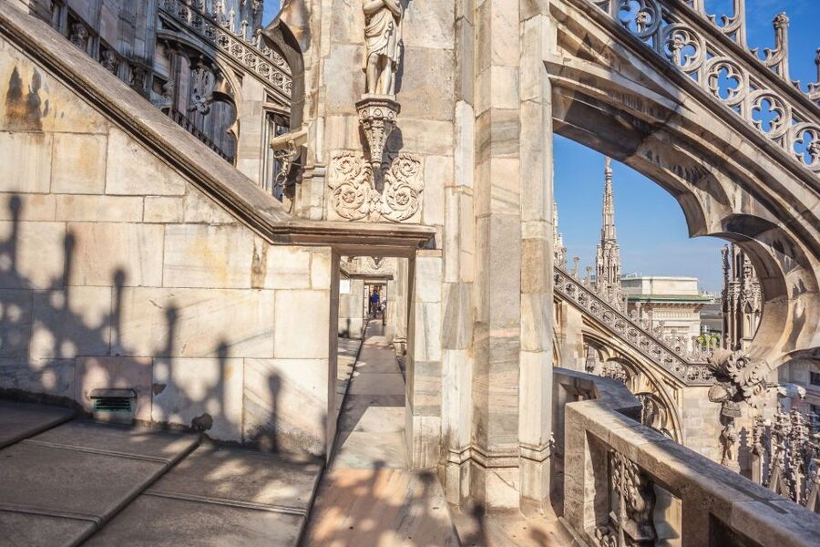 Milan: Duomo Rooftop and Cathedral Guided Tour with Tickets - Statues, gargoyles, and the Duomo’s unfinished story