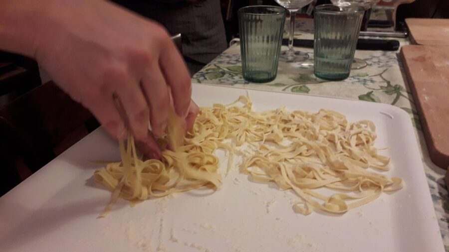 Milan: Italian Cooking Class with Food and Wine - Sitting down for the meal and wine