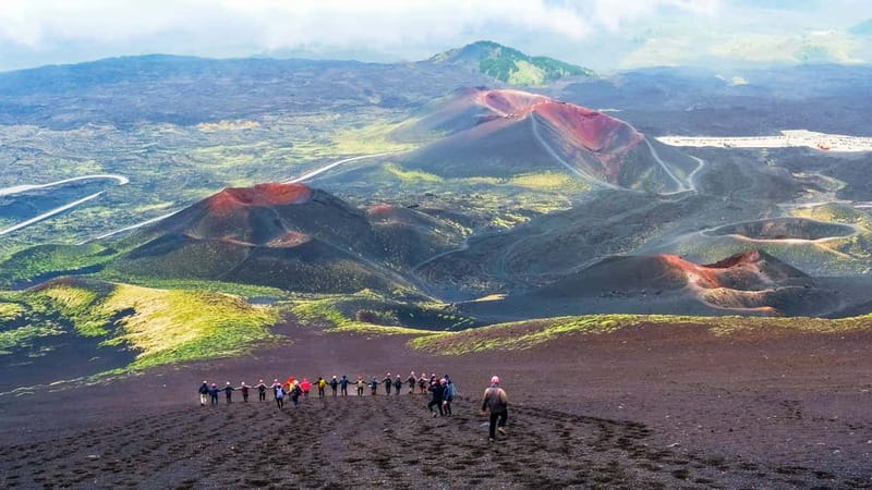 Mount Etna: Trek to 3000m with cable car and jeep - Hiking across black sand and lateral craters