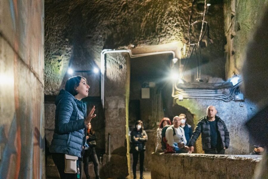 Naples: Naples Underground Entry Ticket and Guided Tour - Walking through the narrow passage