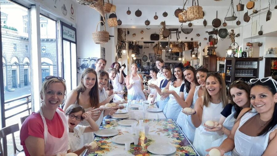 Naples: Neapolitan Pizza and Tiramisù Making Class - Making pizza in front of the San Carlo Theater