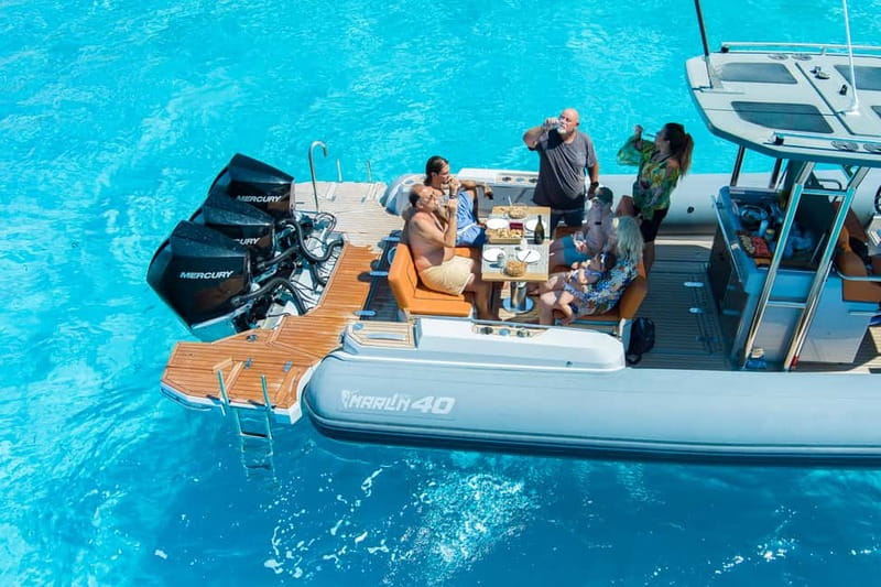 Olbia: Boat tour to Tavolara Park with Aperitif and Drinks - A string of clear-water bays