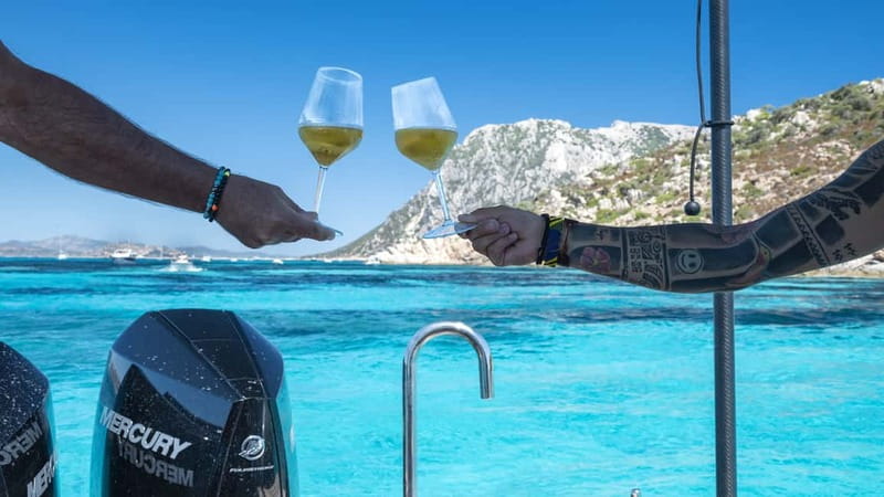 Olbia: Boat tour to Tavolara Park with Aperitif and Drinks - Capo Ceraso on the return