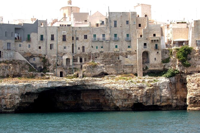 Polignano a Mare boat tour emotions, caves, diving and appetizers - The swim stop, snorkeling, and onboard shower