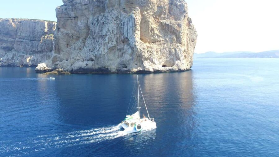 Porto Conte: Half-day catamaran tour with aperitif - Setting Out From Marina di Porto Conte