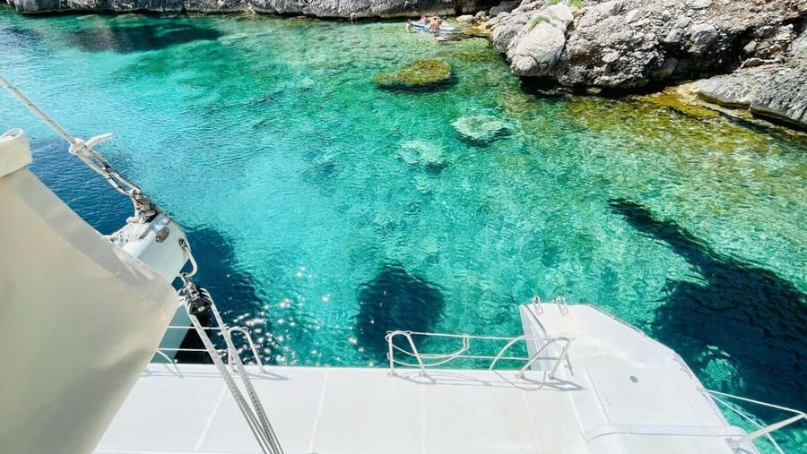 Porto Conte: Half-day catamaran tour with aperitif - What the Small Catamaran Changes