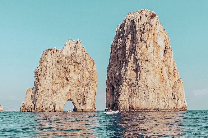 Private Boat Tour of Capri - Passing under the Faraglioni arch