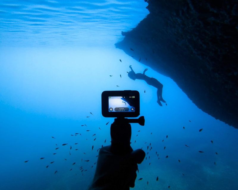 Procida: Boat Tour with Swimming Stops and Underwater Photos - Punta Pioppeto Lighthouse and the final return
